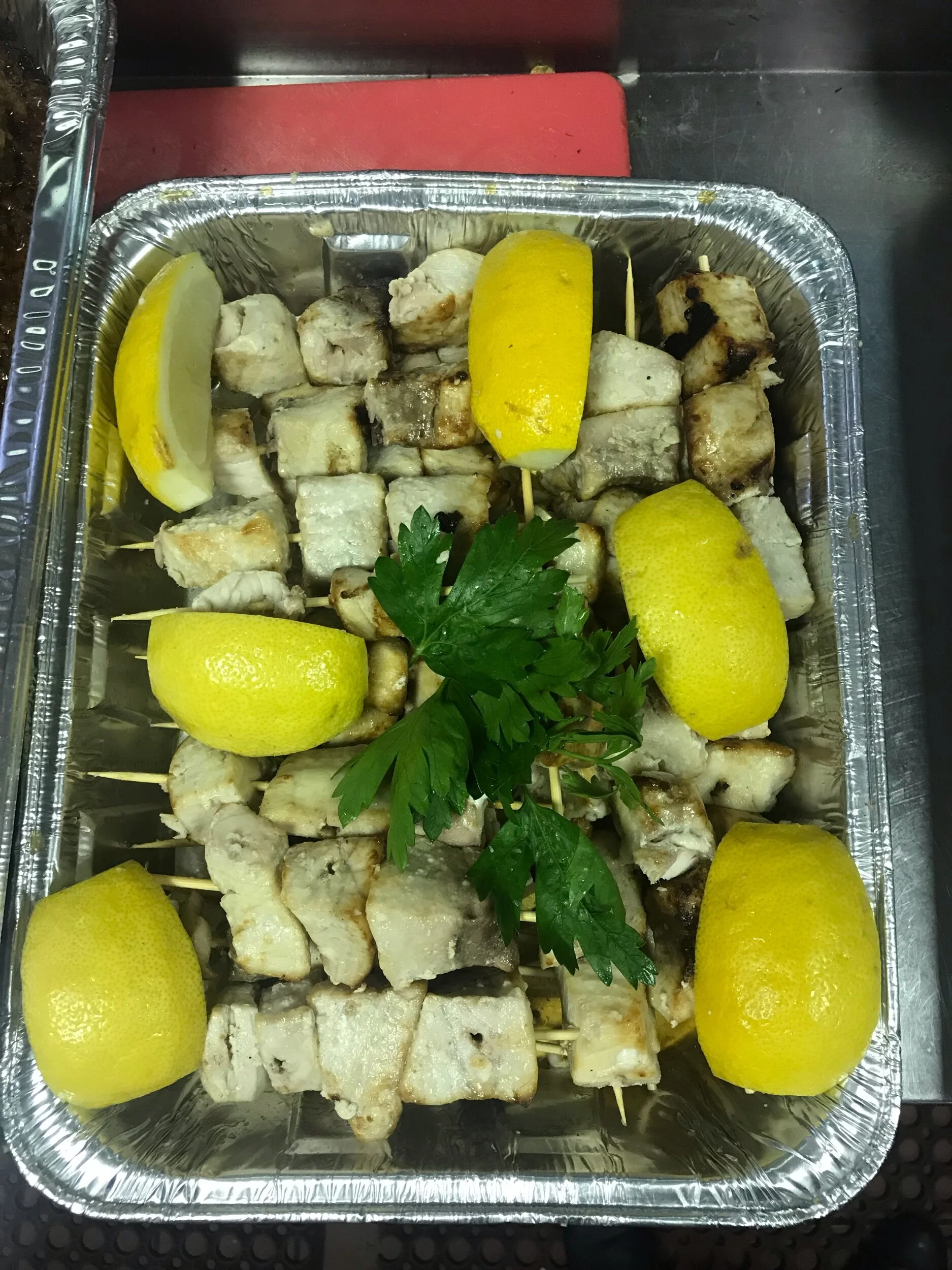 Catering — fish skewers, lemon