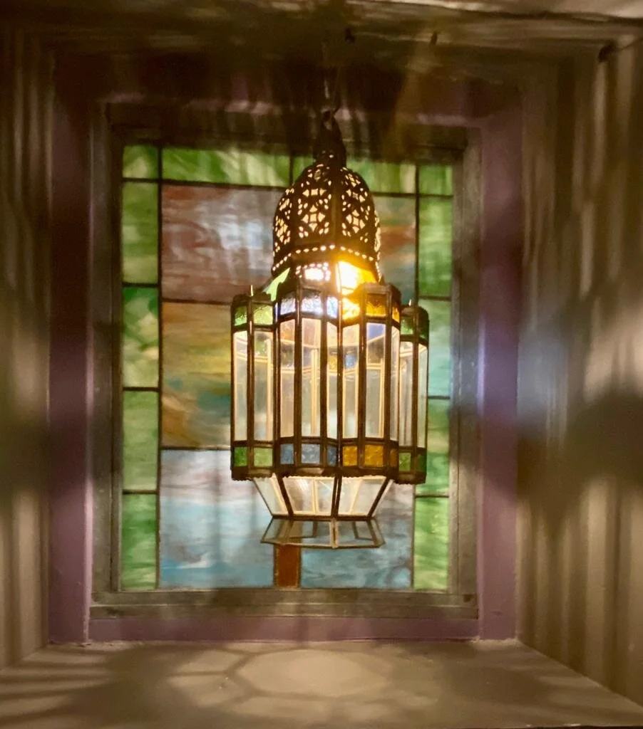 Stained-glass lantern over the bar